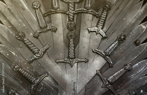 Metal knight swords background close up. The concept Knights