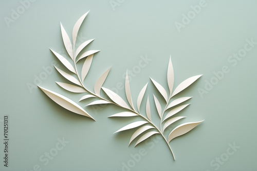 Nature, environment, graphic resources concept. Simple and minimalist floral cut paper art on plain background with copy space. Soft muted pastel colors. Leaf, flower or tree twig gutted from paper