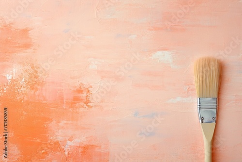 Brush backdrop, Peach Fuzz trend color concept. Background with selective focus and copy space