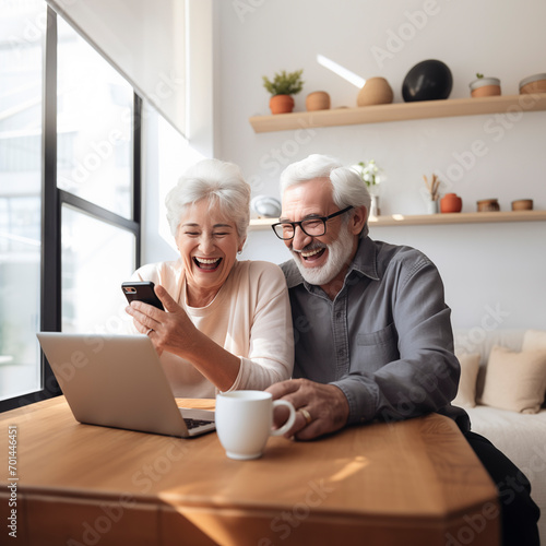 Portrait of a happy old senior couple with a laptop having a video call chat. Retirement senior couple old age lifestyle, communicating by connecting technology people.