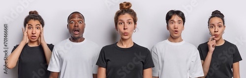 Collage shot of impressed shocked young people dressed in black and white casual t shirts react to something shocking and surprising stand in row isolated over white background. Omg concept.