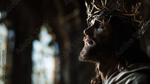 Jesus Christ with crown of thorns on his head in the cathedral. Photorealistic portrait. Close-up.
