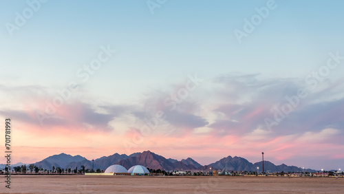 Desert with mountains during sunset in Egypt.