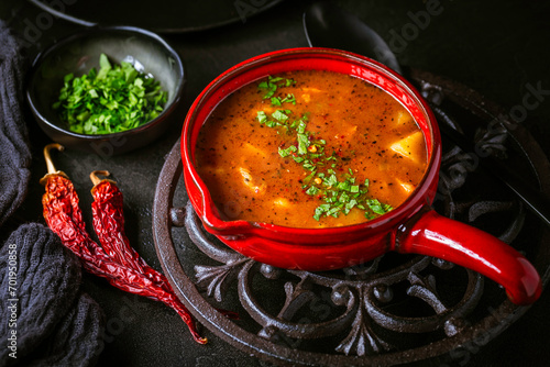 Hungarian hot goulash soup, beef, tomato, pepper, chili, smoked paprika soup. Traditional Hungarian dish.