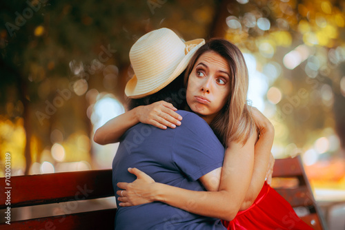 Mother and Daughter Hugging in the park in Reconciliation. Relatives trying to make amends keeping appearances in their relationship 