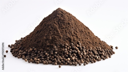 an isolated mound of ground black pepper on a clean white canvas, showcasing the spice's rich color and finely milled texture.