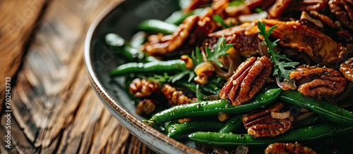 Green beans with caramelized pecans and shallots. with copy space image. Place for adding text or design