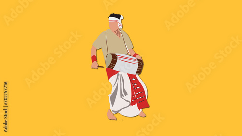 Assamese Bihu Dancer( Dhuliya) in traditional attire with his Dhol in Nature