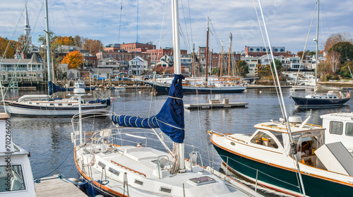 New England Harbor: Yachts, fishing boats and sailing ships gather in Camden, Maine on an October afternoon. 