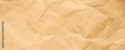Abstract crumpled and creased recycle brown craft paper texture background