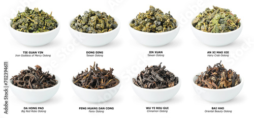 Collection of Chinese oolong tea, loose dries leaves in bowls isolated on white