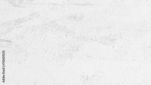 White cement wall in retro concept. Old concrete background for wallpaper or graphic design. Blank plaster texture in vintage style. Modern house interiors that feel calm and simple.