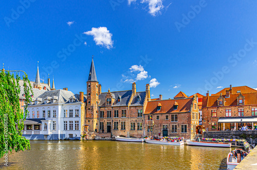 Bruges cityscape, De groote Hollander Huidevettershuis and restaurant in Brugge old town historical city centre, Rosary Quay, Dijver water canal of Reie river, Flemish Region, Belgium