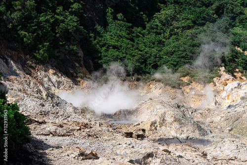 Steam rising from the Sulphur Springs mud baths created from a collapsed volcano in Soufriere, Saint Lucia