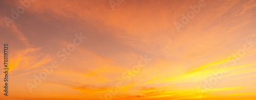 Sunset Sky on Twilight in the winter Evening with Orange Gold Sunset Cloud Nature Colorful Sky Backgrounds, Horizon Golden Sky, Gorgeous.