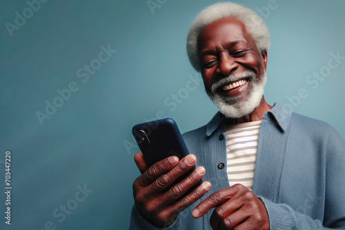 An elderly black man smiling and laughing with his phone against a colored background. ai generative