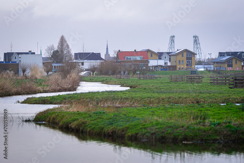 Idyllic view of the Dutch watery polder landscape with the village of Boskoop in the distance