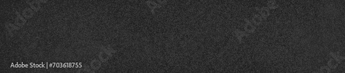 fondo abstracto negro, oscuro, gris, con texturas, brillo. Para diseño, vacío, espacio libre, bandera web, ruido, grano poroso, rugoso, cemento, pared, para diseño, textura de tela, de cerca