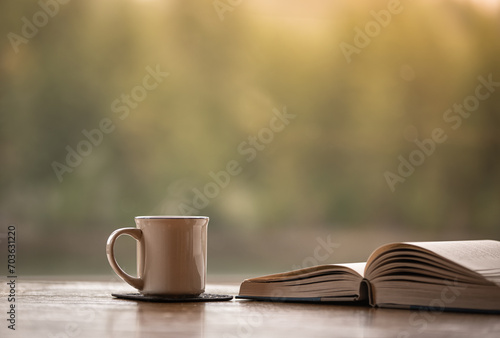 Book coffee or tea on a table, relax and read at hone concept 