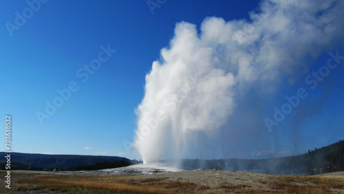 Spectacular panoramic views at Old Faithful Geyser in Yellowstone National Park, Wyoming Montana. Great hiking. Summer wonderland to watch wildlife and natural landscape. Geothermal.