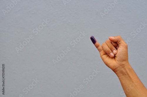 little finger after voting on Indonesia's presidential election