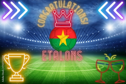 carte de congratulation pour l'équipe nationale de football du Burkina Faso avec un ballon de football colorié au drapeau du Burkina Faso au milieu d'un stade portant une couronne lumineuse