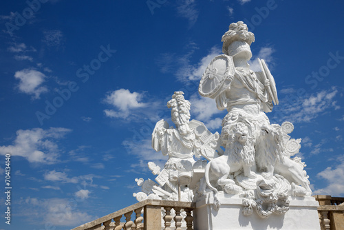 VIENNA, AUSTRIA - JULY 30, 2014: The statue of guardians in Gloriette in Schonbrunn palace. The sculpture (1775) was designed by architect Johann Ferdinand Hetzendorf von Hohenberg.