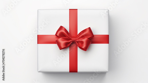 top view of white present lid with red ribbon bow isolated on white background