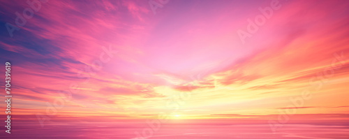 Vibrant rich purple, pink and yellow Fantasy vibrant panoramic sunset sky - Gradient rich colors - ethereal dreamy summer sunset or sunrise sky. Uplifting and peaceful sky.