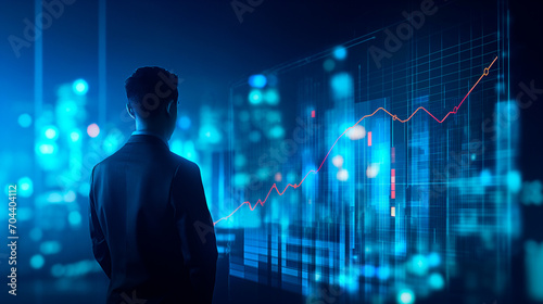 Silhouette of a person analyzing futuristic financial graph on cityscape background. 