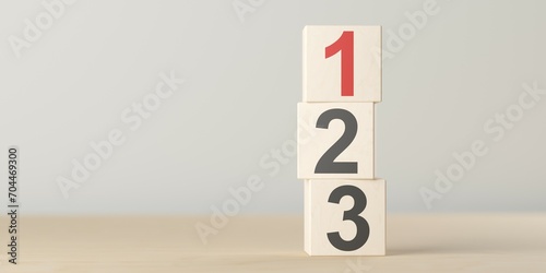 Numbers one, two and three on wooden blocks standing on table, plan, priority or winner business concept