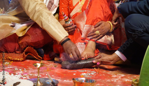Closeup of indian hindu couple holding each other hands during marriage symbolizing love togetherness and promise bride groom wedding ring Bride & Groom Hand' Together in Indian Wedding