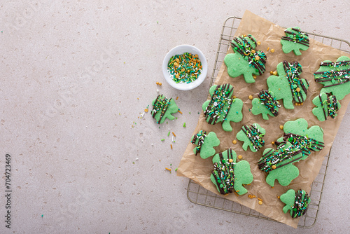 Shamrock cookies for Saint Patricks day with chocolate glaze and sprinkles