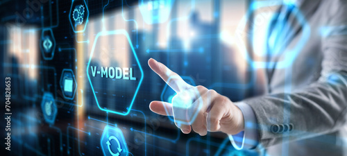 Businessman clicks V-Model, VEE. Information systems development model