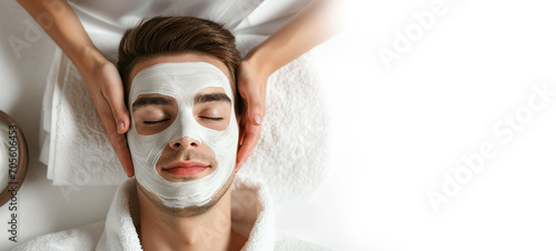 Top view of handsome young man relaxing with facial mask at spa with copy space, Healthy wellness, Healthcare lifestyle, Life balance Concept