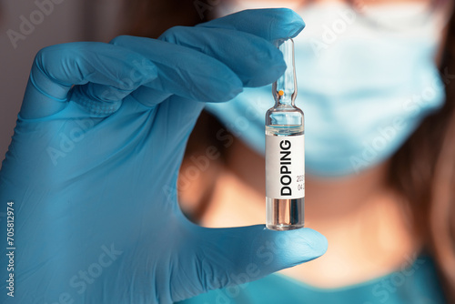 A doping ampoule in a nurse's hand