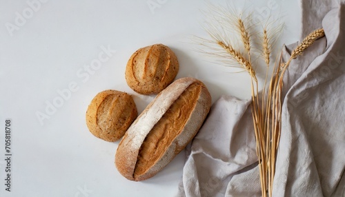 freshly baked bread on a white background wholegrain bread flat lay food concept