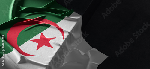 Flag of Algeria. Fabric textured Algeria flag isolated on dark background. 3D illustration