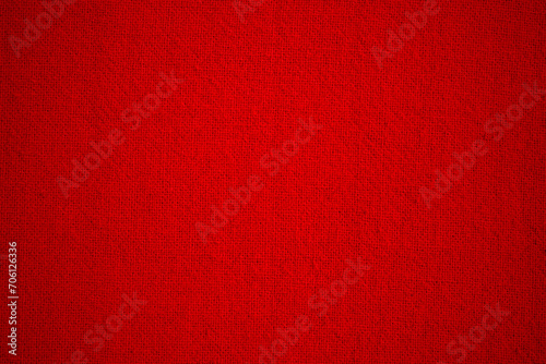Dark red cotton fabric cloth texture background, seamless pattern of natural textile.