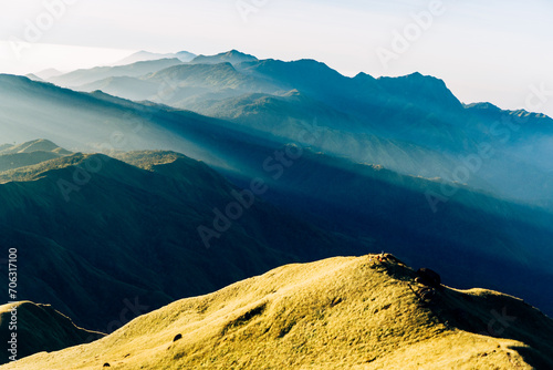 Golden hour sunlight on mountain ridges