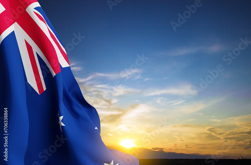 Flag of Australia against the sunset. Australia Day background