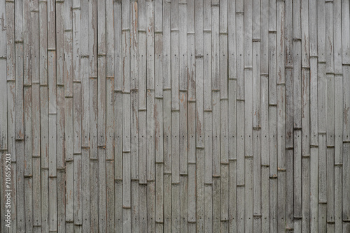Weathered bamboo Japanese wall. Bamboo wood fences are used to separate built constructions.