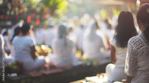 People participating in a silent meditation on the day of Nyepi, Nyepi, blurred background, with copy space