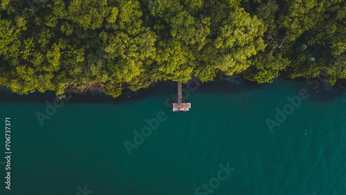 aerial view of a wooden jetty in the Parana River or Rio Parana, the second bigger river of Brazil. Panorama, SP, Brazil