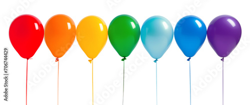 Line of helium balloons in rainbow colors on strings isolated on white background