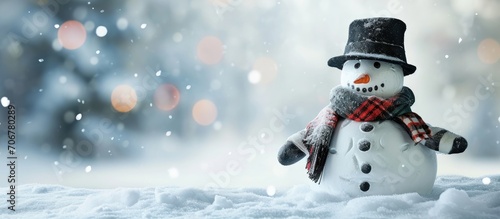 Snowman with hat and scarf in winter outdoor Snowman gentleman in winter black hat scarf and gloves Xmas or christmas party copy space. with copy space image. Place for adding text or design