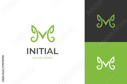 abstract leaf letter M logo icon design with grow graphic concept for nature biology identity logo template