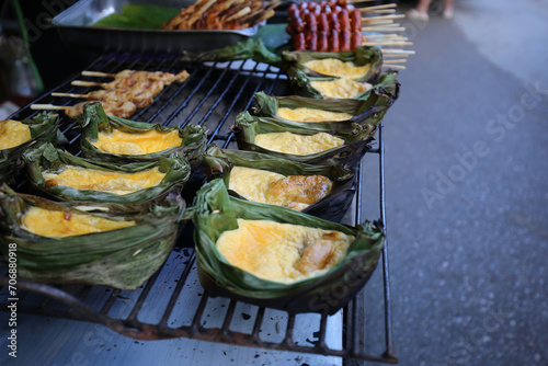 Style Food, Thai grilled egg in banana leaf cup in mae kampong village,Kai Pam, Chiang Mai, Thailand