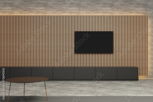 Flat screen TV on acoustic panel covered wall. Clean minimalist interior. Ambient lighting around acoustic panelling. Wide shot. Template for TV creative
