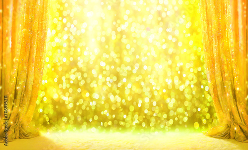 光がキラめく華やかなゴールドイエローカラーのカーテンを使った背景